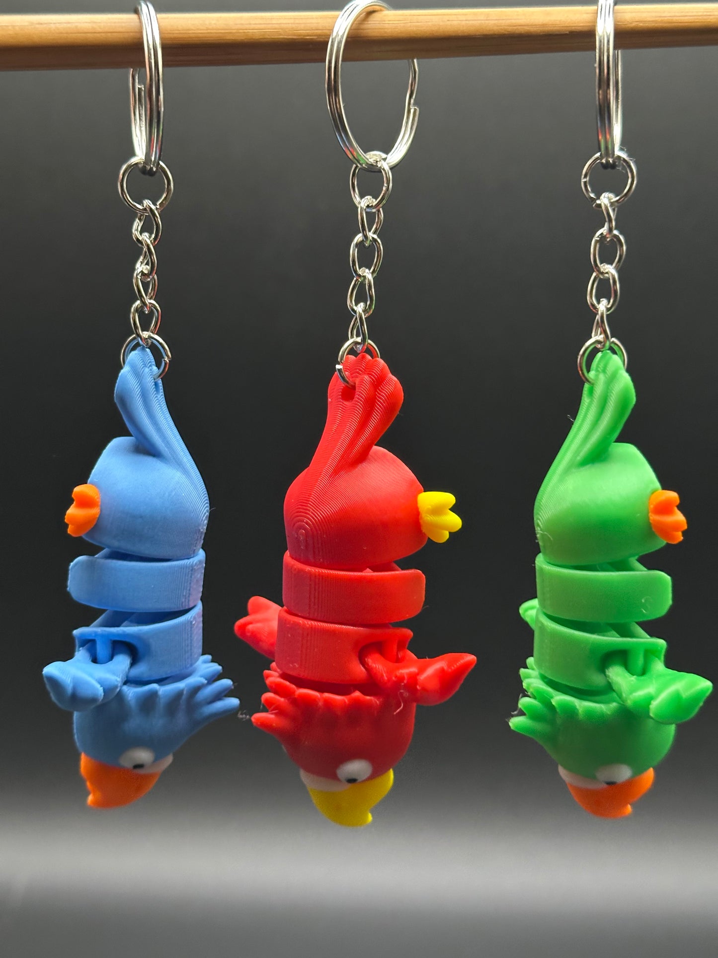 Articulated Parrot Fidget Keychain β Wiggle & Twist This Fun Feathery Friend! π¦β¨
