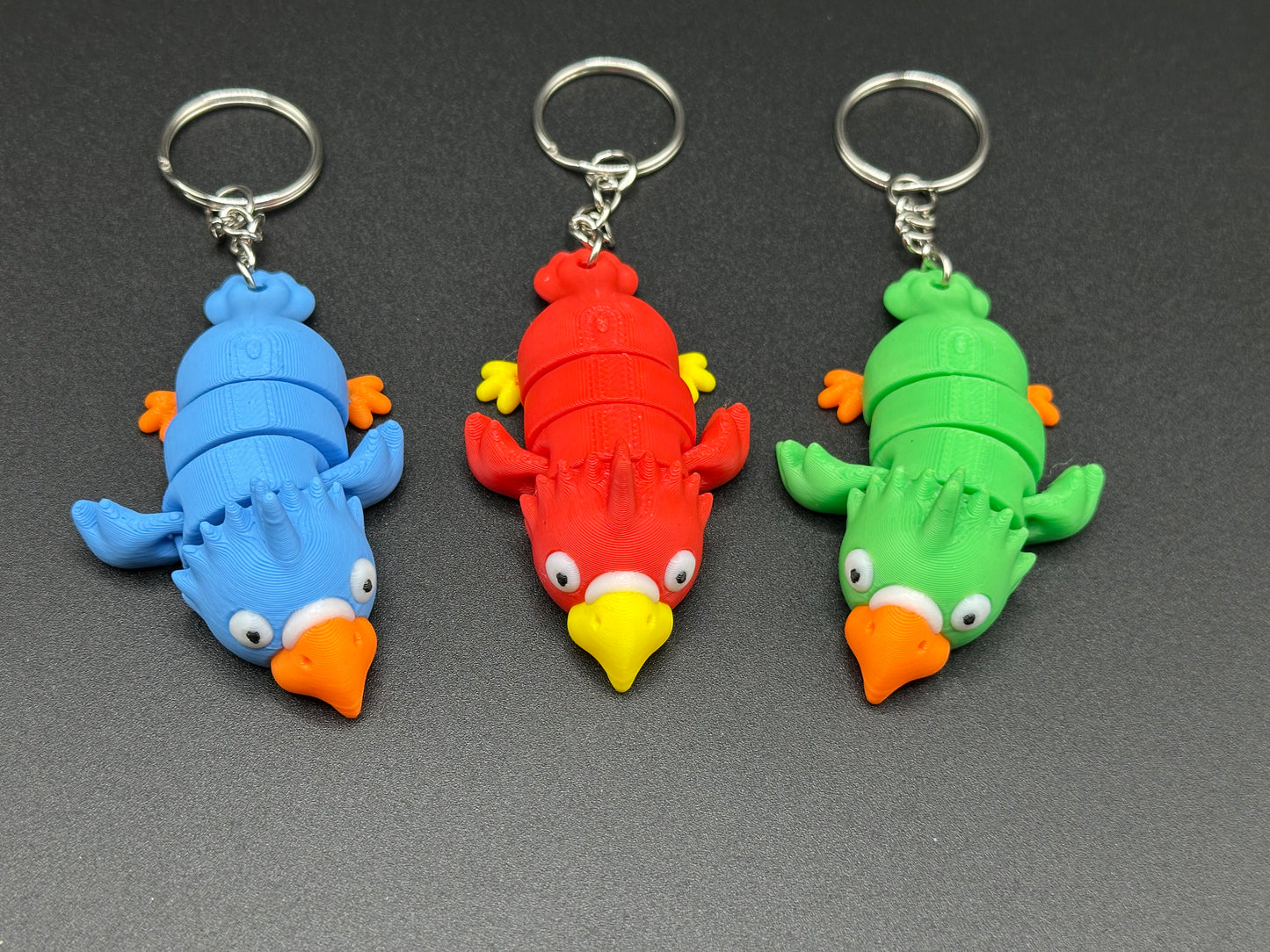 Articulated Parrot Fidget Keychain β Wiggle & Twist This Fun Feathery Friend! π¦β¨