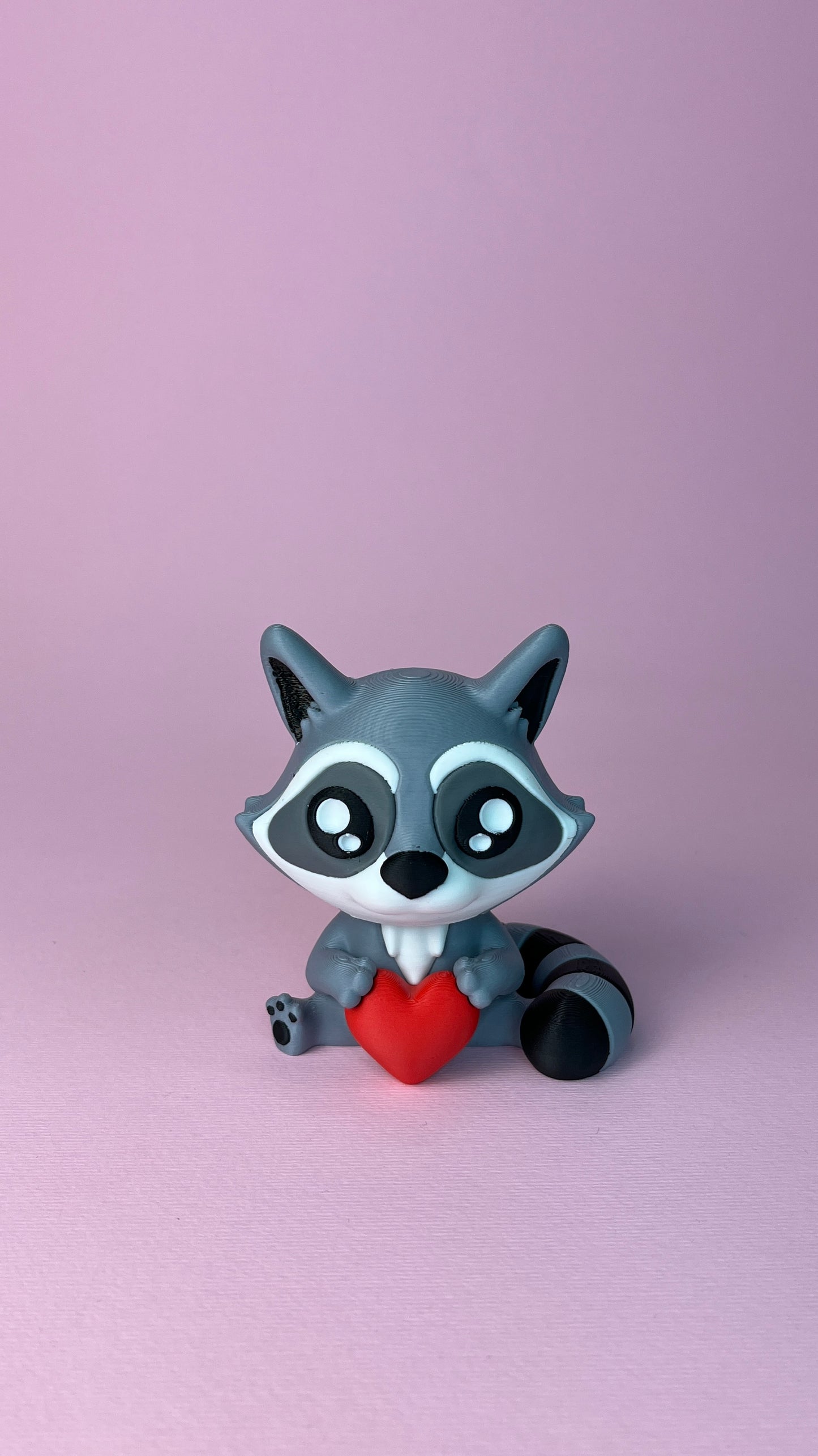 Clicky Raccoon with Heart – Adorable and Satisfying Fidget Toy